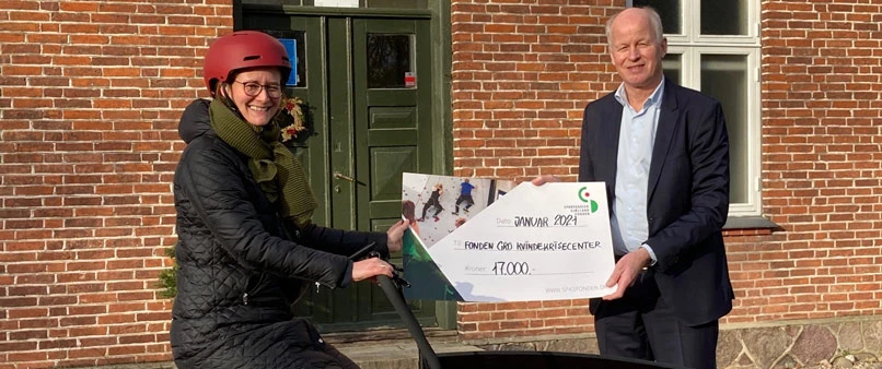 Signe Berner Kruuse, Krisecenterleder på Fonden GRO Kvindekrisecenter, og Claus Andersen, Områdedirektør i Sparekassen Sjælland-Fyn.